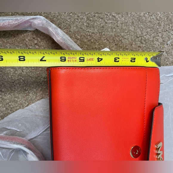 MICHAEL KORS
MOTT
35SOGOXC7L
LG CLUTCH XBODY
LEATHER
MANDARIN - Picture 3 of 11